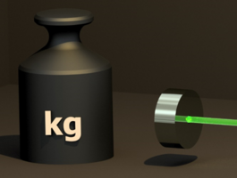 Titanium machined vacuum chamber with several fibers and coils attached.